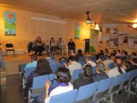 15. El público aplaude durante la mesa redonda sobre comunicación y biodiversidad.