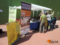 Stand del Proyecto Monachus en la explanada del frontón de Huerta de Arriba (Burgos).